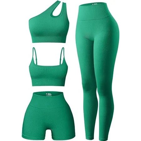 A set of green clothing that includes leggings, top and shorts.